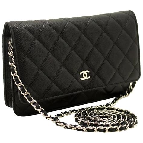 all black chanel crossbody|Black Chanel bag with chain.